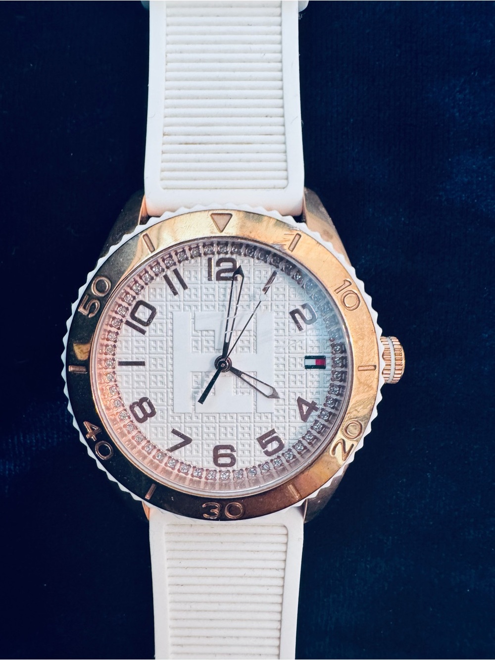 Tommy Hilfiger, vintage(ish), rose-gold tone with a rubber watch band. SO COOL!